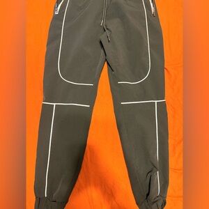 Sleek Black Joggers with Reflective Piping